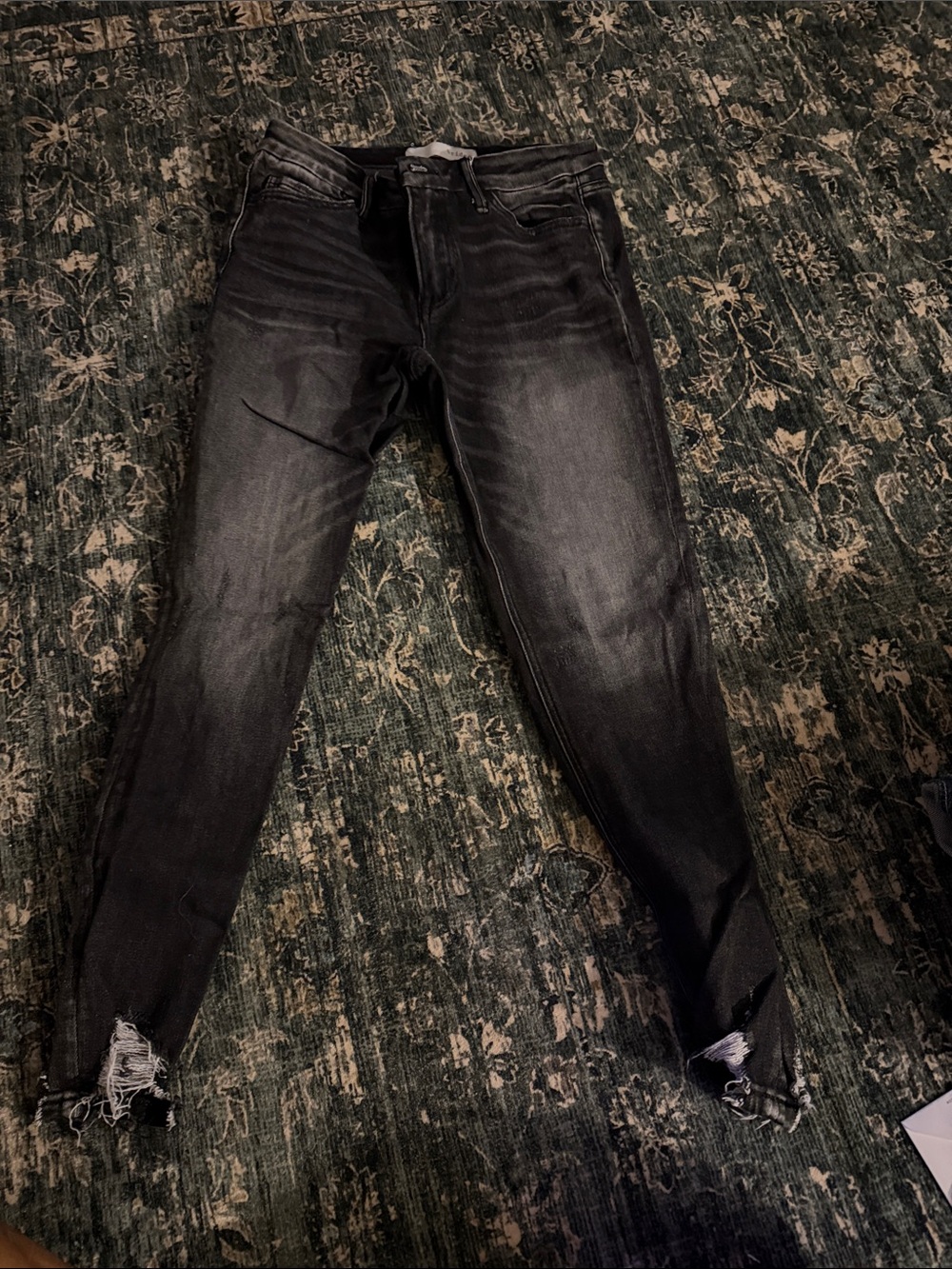 Women's Black Skinny Jeans with Distressed Hems